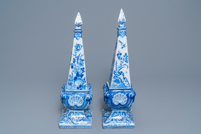 A pair of impressive Dutch Delft blue and white obelisks, 18th C.